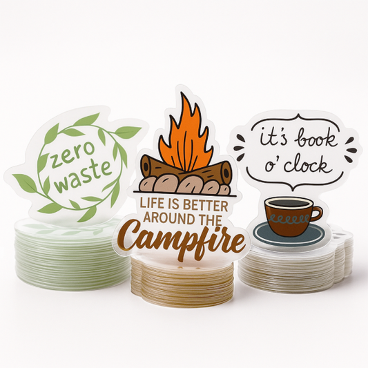 .0015 Décalques Formes Spéciales Polyester Transp. Luisant / endos adhésif std pour usage extérieur (1 à 4 pouces carrés) Quadrichromie et blanc